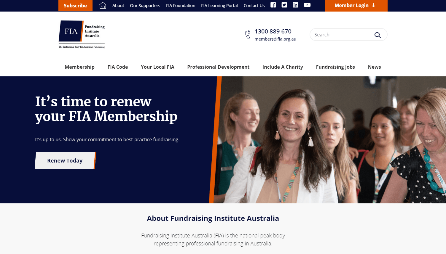 Group of smiling women at a fundraising event promoting FIA membership renewal.