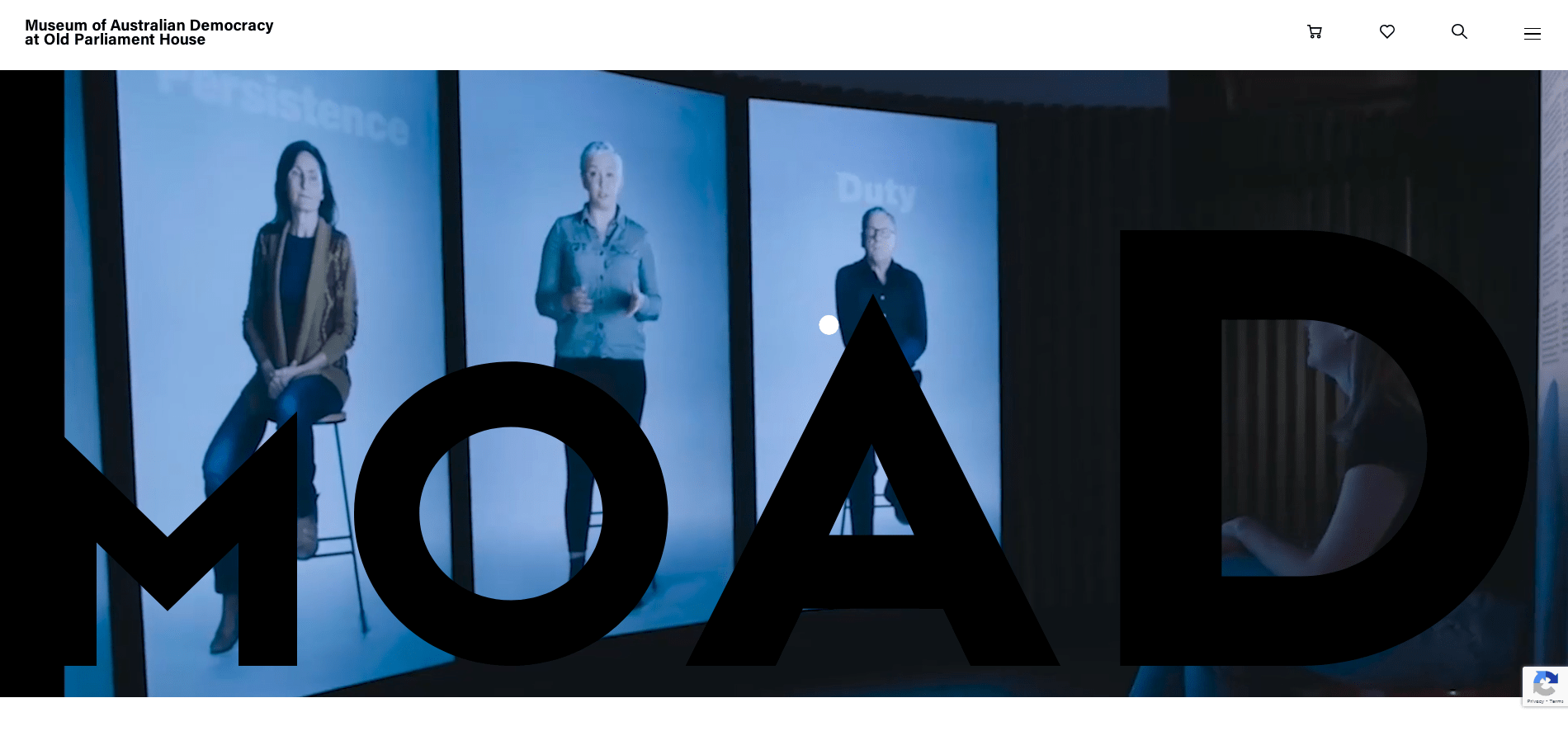 Three women displayed on large vertical screens in a dark room at the Museum of Australian Democracy.