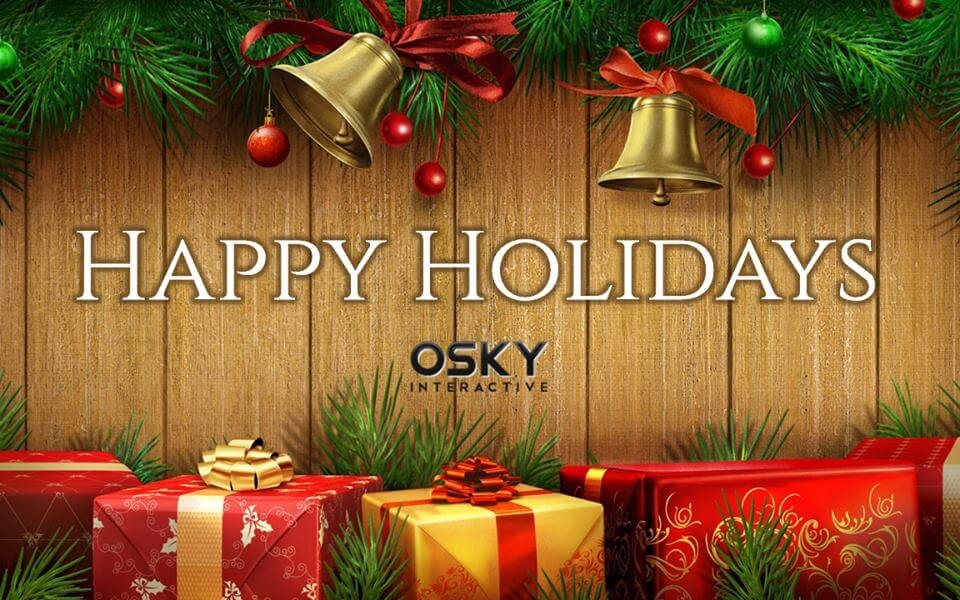 Festive holiday greeting with gold bells, red ornaments, wrapped gifts, and pine branches on a wood background.